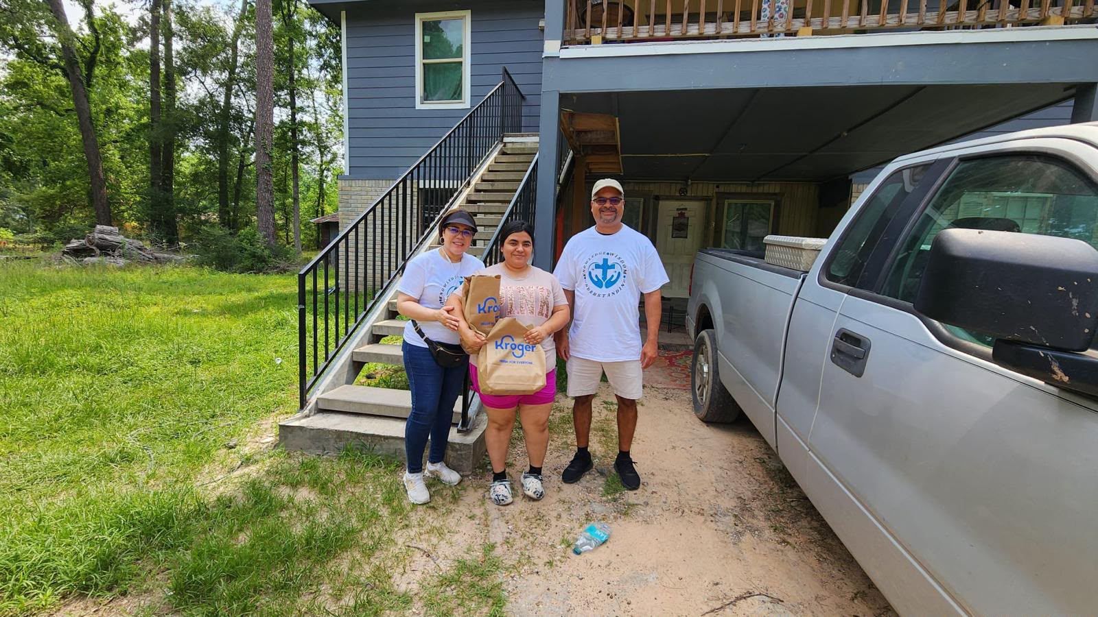 Volunteers delivering family resources